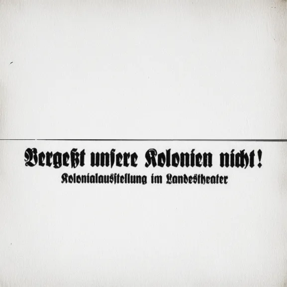 Titel des Zeitungsartikels "Vergeßt unsere Kolonien nicht" Kolonialausstellung im Landestheater