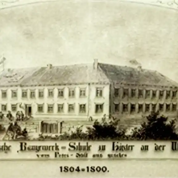 Stilisierter Ausschnitt einer Informationstafel, die mit einer historischen Ansicht an die ehemalige Nutzung erinnert.